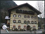 Towards the end of the film, the bus bursts out of a garage and past this Lofer building.