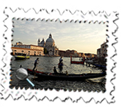 Various forms of water transport close to Santa Maria della Salute at dusk