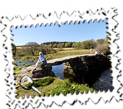 Mum on Postbridge's clapper bridge.