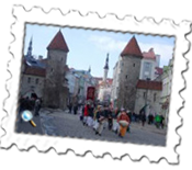 A procession takes place just outside one of the entrances to Tallinn's Old Town