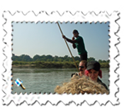 If not exactly on the high seas at Chitwan, we were impressed that the ferryman had time to make a call...