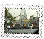 Calcutta's Howrah Bridge looms.